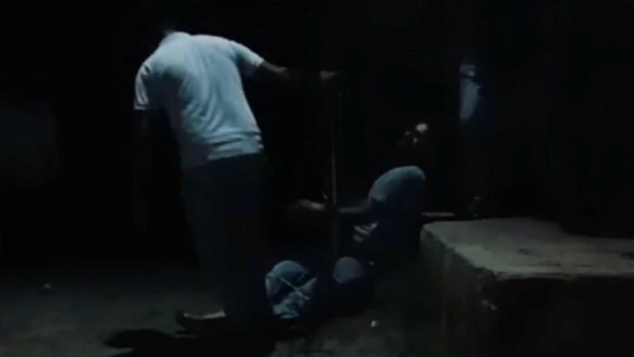 The youth was tied to a pole and beaten up
