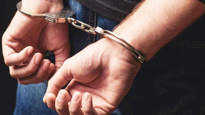 Two policemen arrested