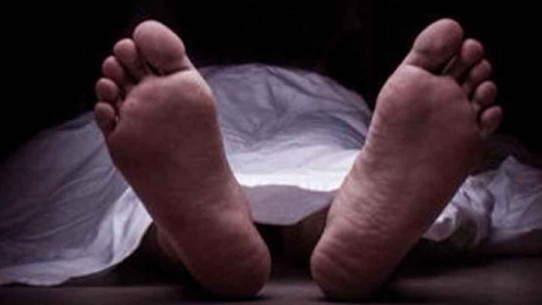 Blood-stained body of a young man found in a field