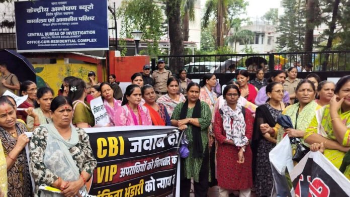 Women lay siege to CBI office amid heavy rain